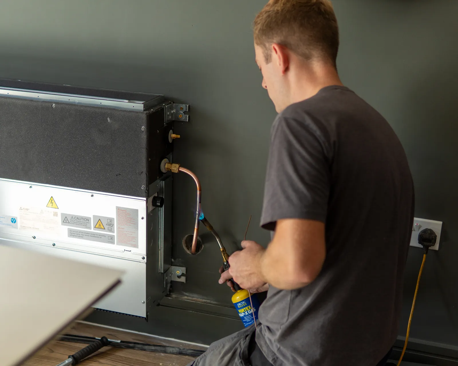 Air Conditioning Engineer With Blow Torch