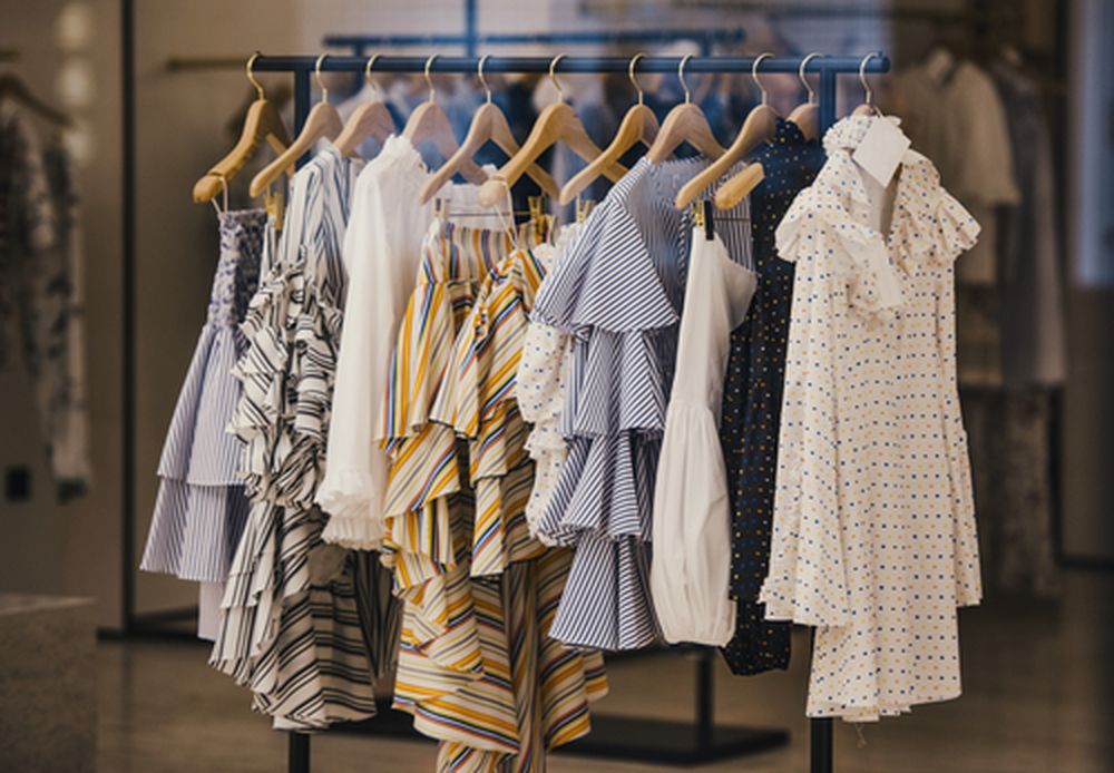 Old Clothes Hanging On A Rack