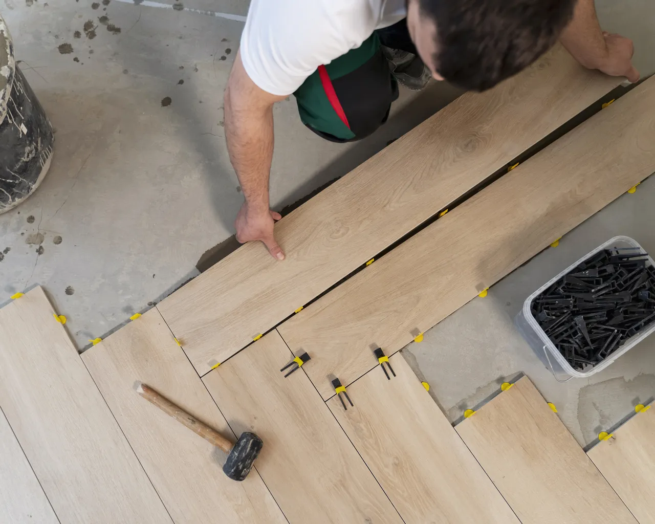 Man Tiling Floor