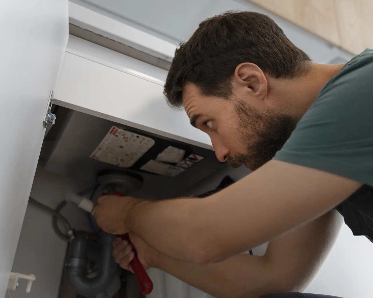 Low Angle Man Working As Plumber